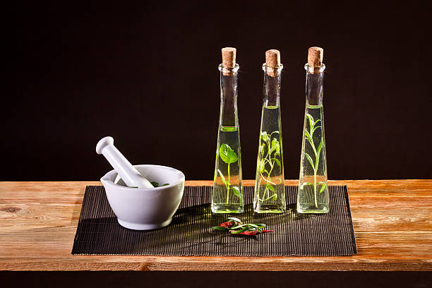 新鮮なスパイス、植物油 - rosemary herb isolated ingredient ストックフォトと画像