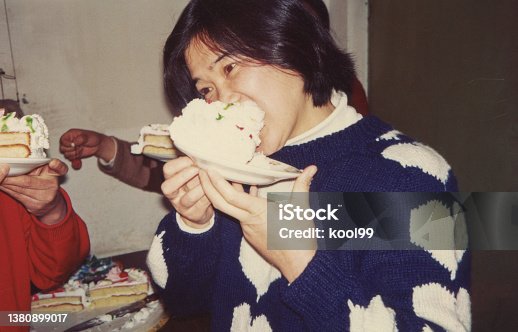 istock 1980s Chinese Women Eating Birthday Cake Photo of Real Life 1380899017