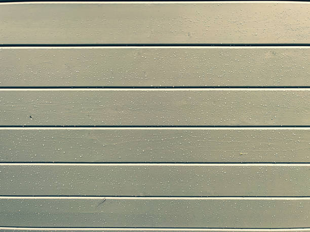 istock Wet light grey lacquered wooden wall. 1380914658