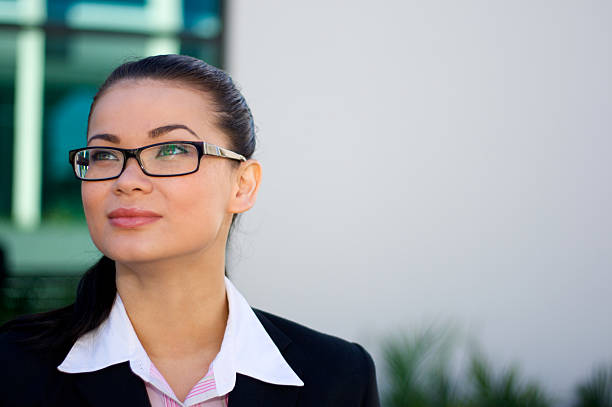 istock Businesswoman looking up with copy space 138091847