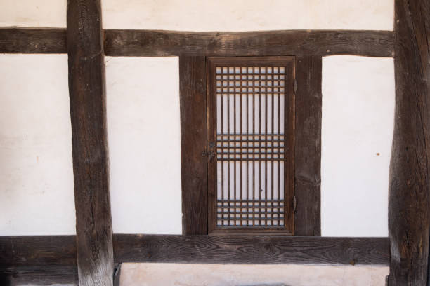 istock Small door next to traditional Korean house 1380948074