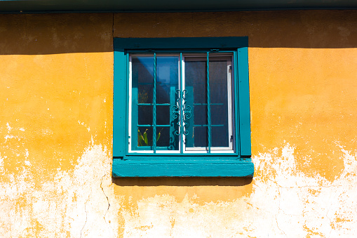 Santa Fe Style: Green Window in Old Orange Wall (Close-Up)
