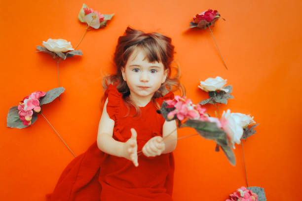 Adorable little child celebrating spring and nature