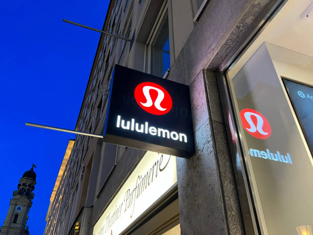 Lululemon Athletica Yoga Fashion Store Munich, Bavaria Germany - February 22, 2022: Lululemon Athletica high end fashion at home yoga sports wear shop - store front with logo in Munich Germany. consumer confidence photos stock pictures, royalty-free photos & images