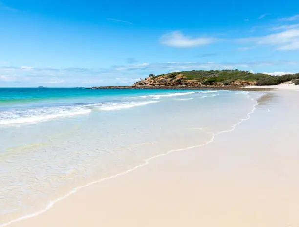 Long beach is one of the many pristine white sand beaches on Keppel Island in  tropical Queensland.