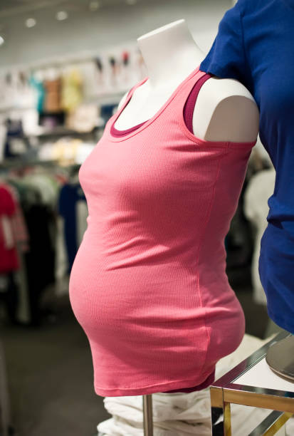 istock Side view of headless pregnant mannequin in store. 138095774