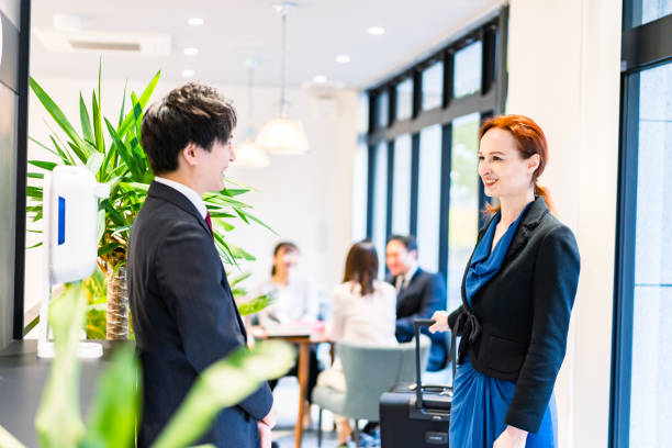istock International guests checking in at a hotel 1380963107