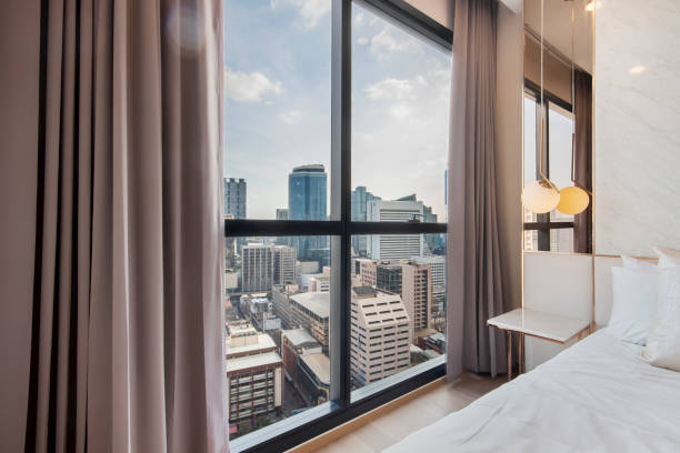 istock large window in the bedroom overlooks the building. 1380973201