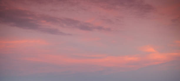 istock Real amazing panoramic sunrise or sunset sky with gentle colorful clouds. Long panorama, crop it 1380978689