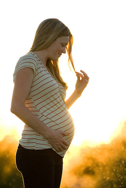 Happy pregnant woman stock photo