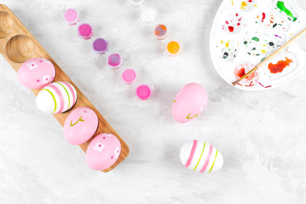 istock Easter Holiday Concept. Flat lay with painting Easter eggs and paint. Top view 1380985629