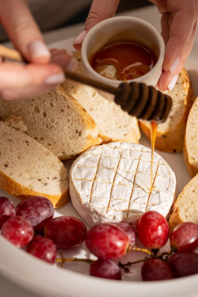 istock Baked brie cheese with grilled bread for dinner 1380985955