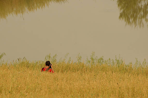 Photographer has reached the fish pond in Tuscany.