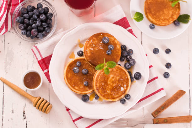 istock Pancakes with blueberries and chocolate cream. 1381015138