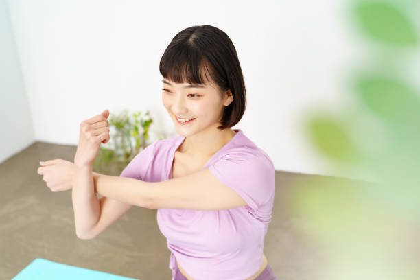 istock Woman doing yoga and flexible exercise 1381017739