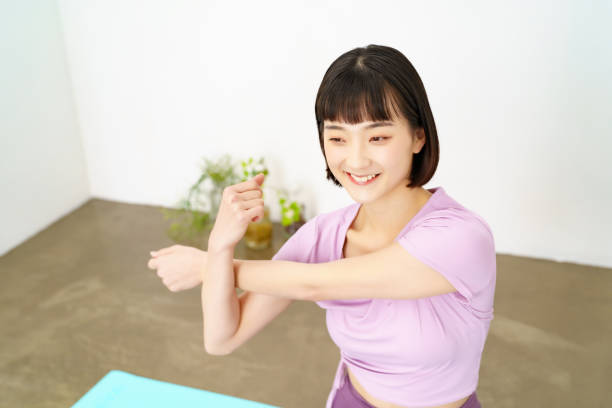 istock Woman doing yoga and flexible exercise 1381017813