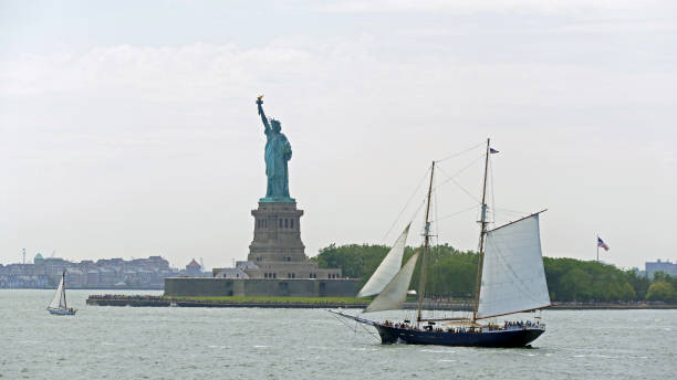 istock Sailing by the Liberty statue in New York 1381026812