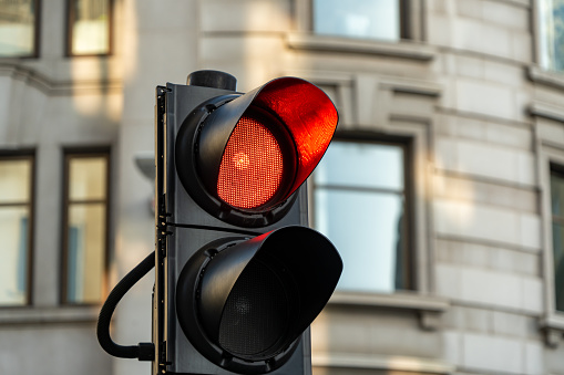 A traffic light on red