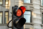 A traffic light on red