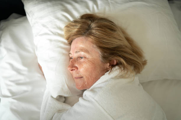 istock Woman in a bed 1381074170