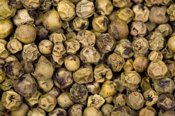 istock Green peppercorn background 1381095638
