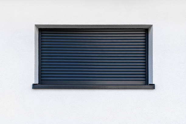 istock Large window in anthracite color with fully covered external blinds, view from the outside of the building. 1381102456