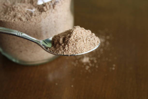 istock Milky coffee powder in spoon 1381103487