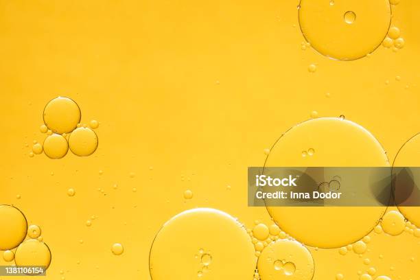 Golden Yellow Abstract Oil Bubbles Or Face Serum Background Stock Photo - Download Image Now