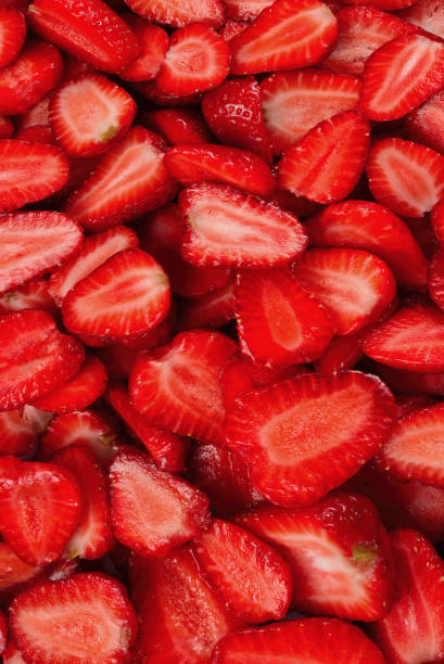 istock Strawberry slices. Fresh berries macro. Fruit background. Top view. 1381107729