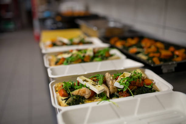 istock Meals in containers prepared for take away in kitchen restaurant. 1381119502