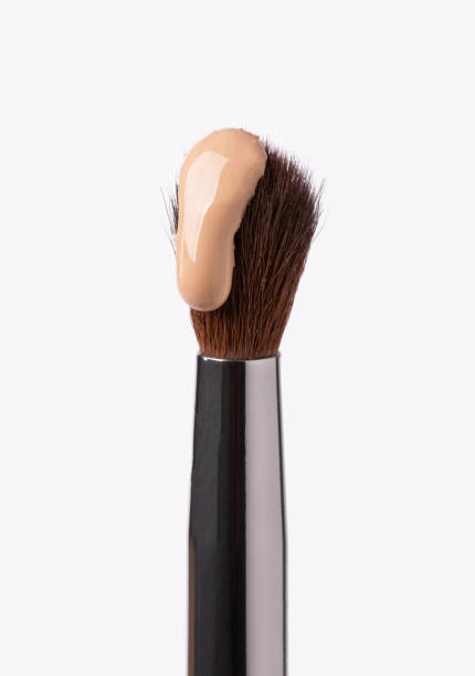 istock Beige liquid foundation or bb cream on brush. 1381120484