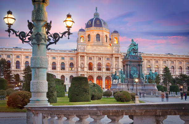 Maria-Theresien-Platz square in Vienna Wien, Austria - Feb 20, 2022: Kunsthistorisches Museum (Art History Museum) and statue of Maria Theresa empress at Maria-Theresien-Platz (square) by twilight vienna austria photos stock pictures, royalty-free photos & images