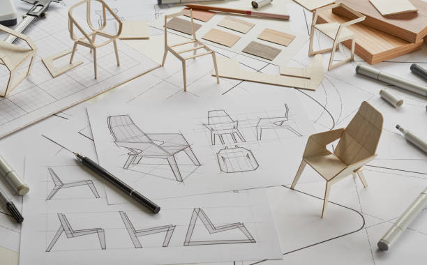 istock Designer sketching drawing design development product plan draft chair armchair Wingback Interior furniture prototype manufacturing production. designer studio concept . 1381150479