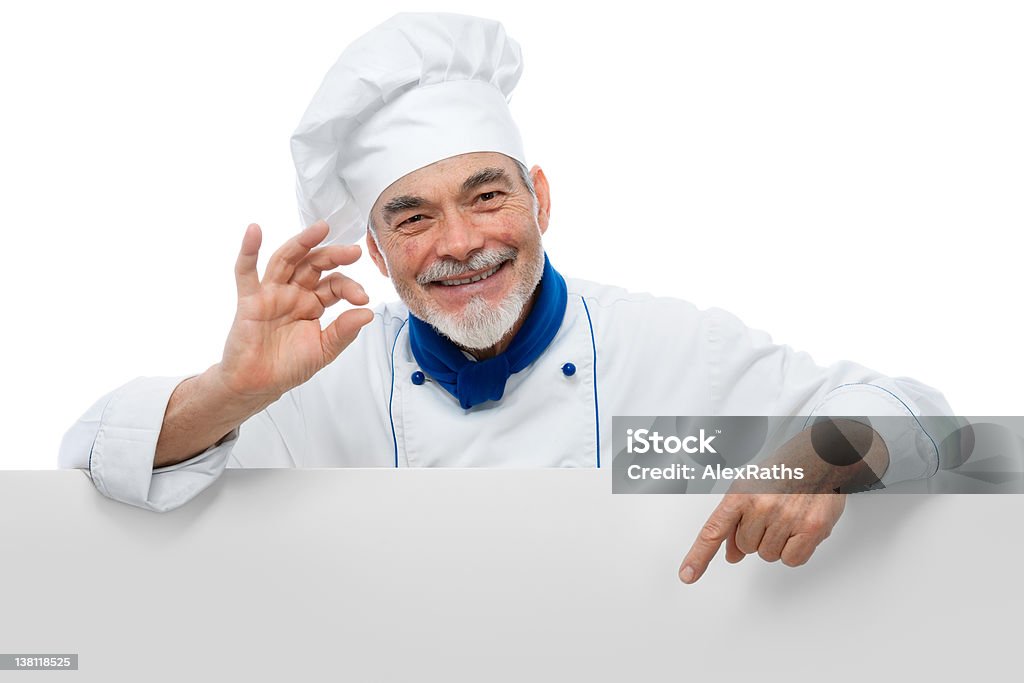 Handsome chef Chef presenting. Isolated on white background Chef's Whites Stock Photo