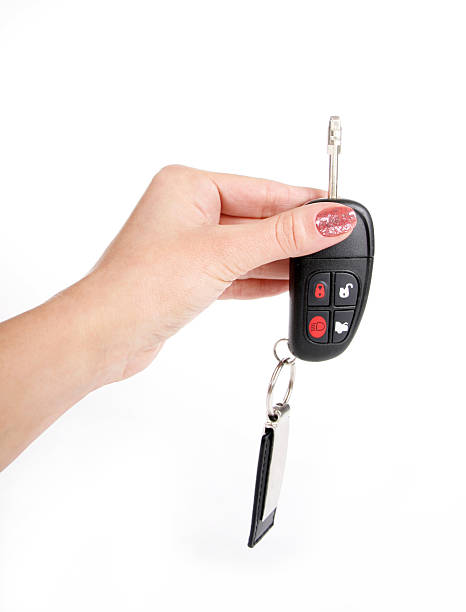 istock Female hand holding a car key 138119099