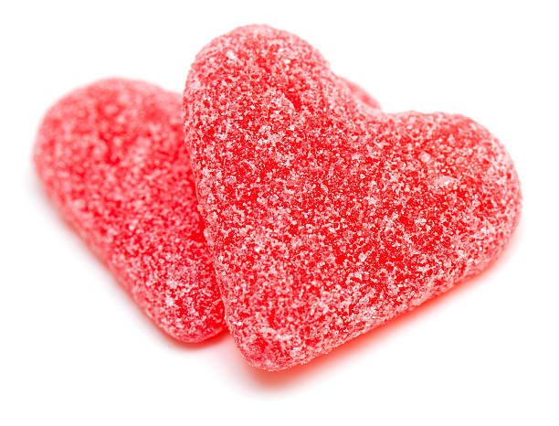 istock two heart-shaped candies isolated on white background 138120872