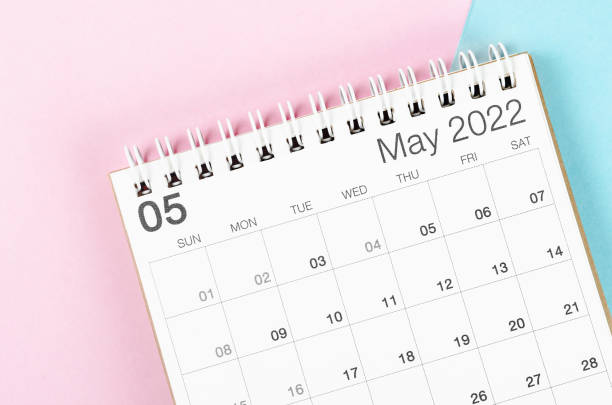 istock May 2022 desk calendar on beautiful background. 1381220926