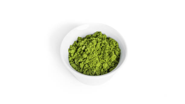 istock Green matcha powdered tea isolated on white background 1381227909