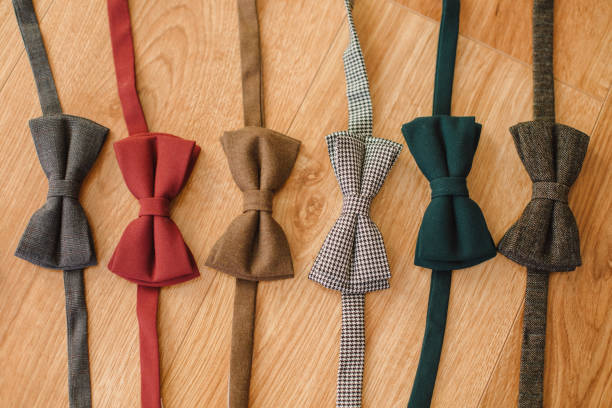 Set of different bow tie on background. Bow tie for attractive businessman.
