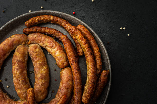 istock Baked pork sausages with spices 1381234801