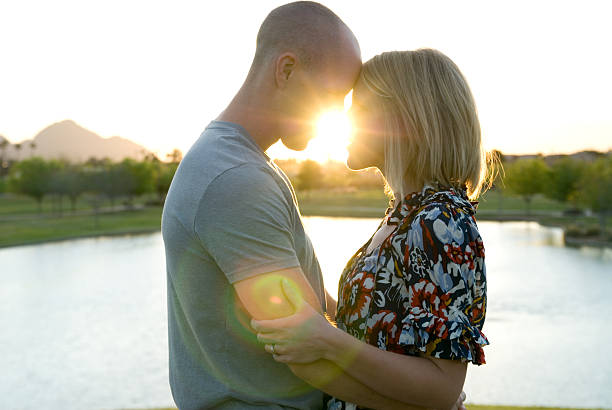 Happy couple at twilight stock photo