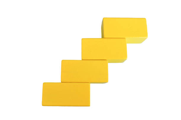 istock Yellow wooden cube blocks isolated on a white background 1381239751