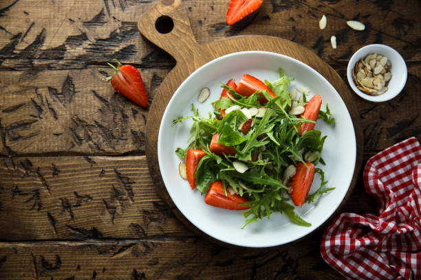 istock Arugula salad with strawberry 1381243805