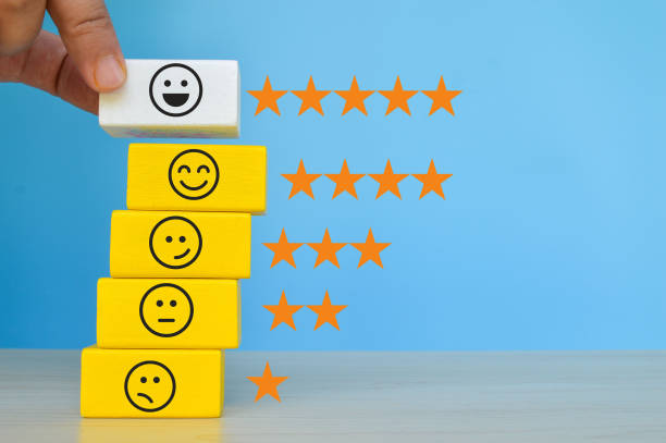istock Wooden cube blocks with different face emotion. Customer evaluation and satisfaction concept. 1381244558