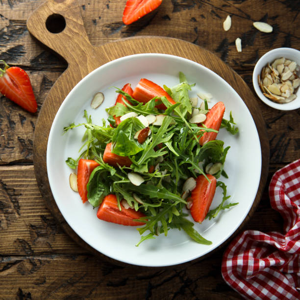 istock Arugula salad with strawberry 1381245638