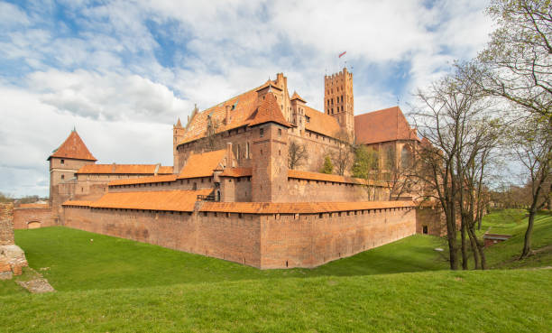 Malbork Catle, Poland Malbork, Poland - largest castle in the world by land area, and a Unesco World Heritage Site, the Malbork Castle is a wonderful exemple of Teutonic fortress marienburg stock pictures, royalty-free photos & images
