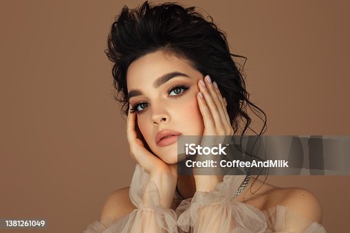 istock Beautiful woman with perfect make-up 1381261049