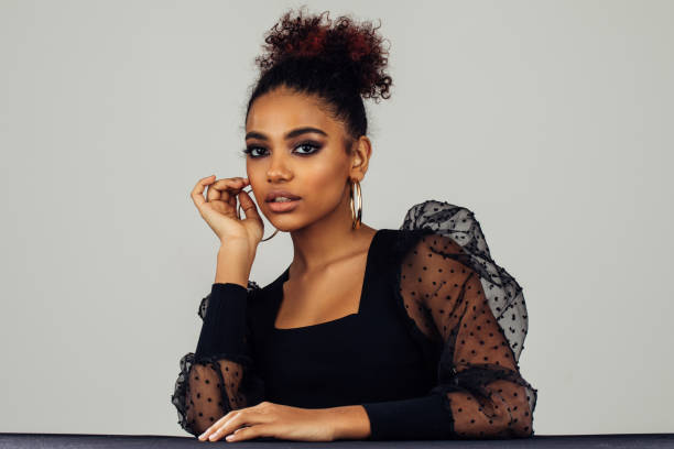 istock Beautiful afro woman with perfect make-up 1381269552