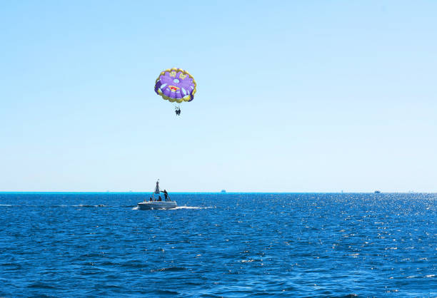 istock Funny parasail wing pulled by a boat. Sea summer recreation. Sky clear Hurghada Egypt 1381273223