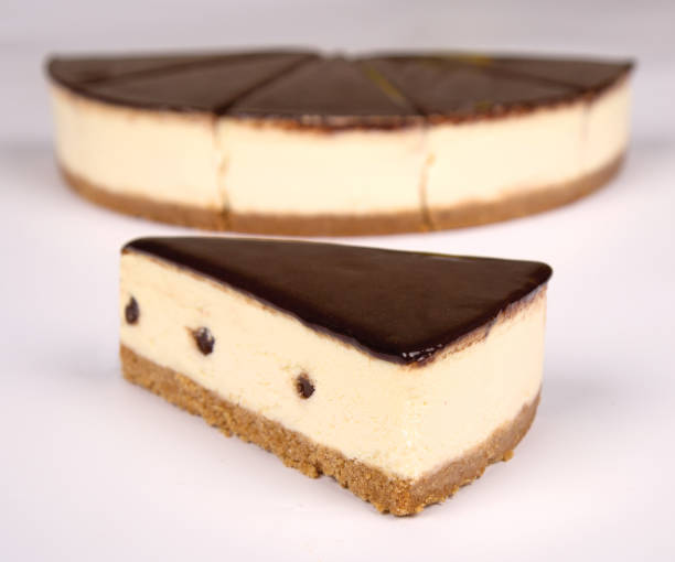 istock Whole chocolate cheesecake. Chocolate cheesecake served on a white background. 1381294942